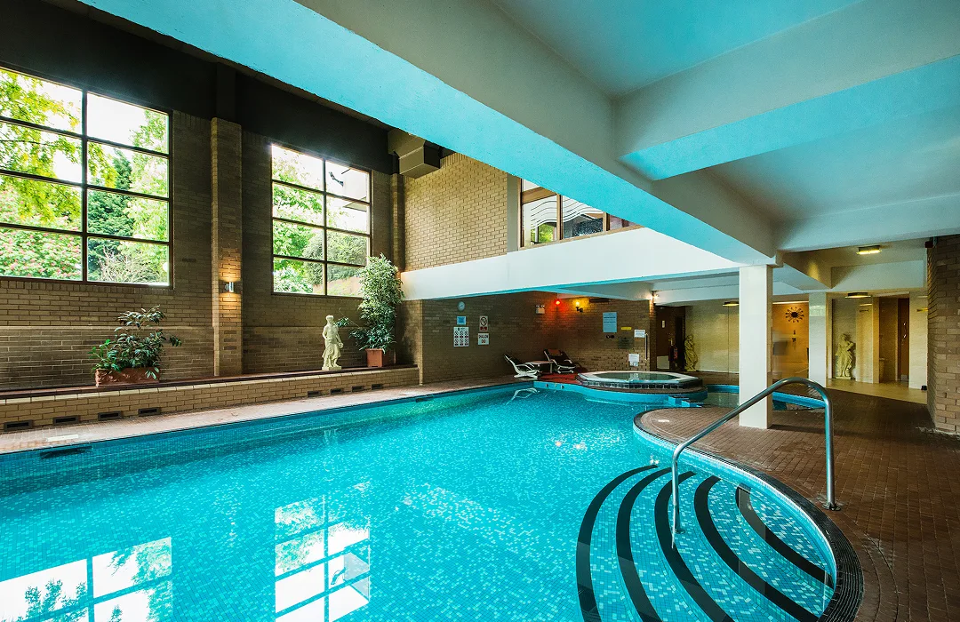 The heated pool and Jacuzzi of the Arden Hotel & Leisure Club.