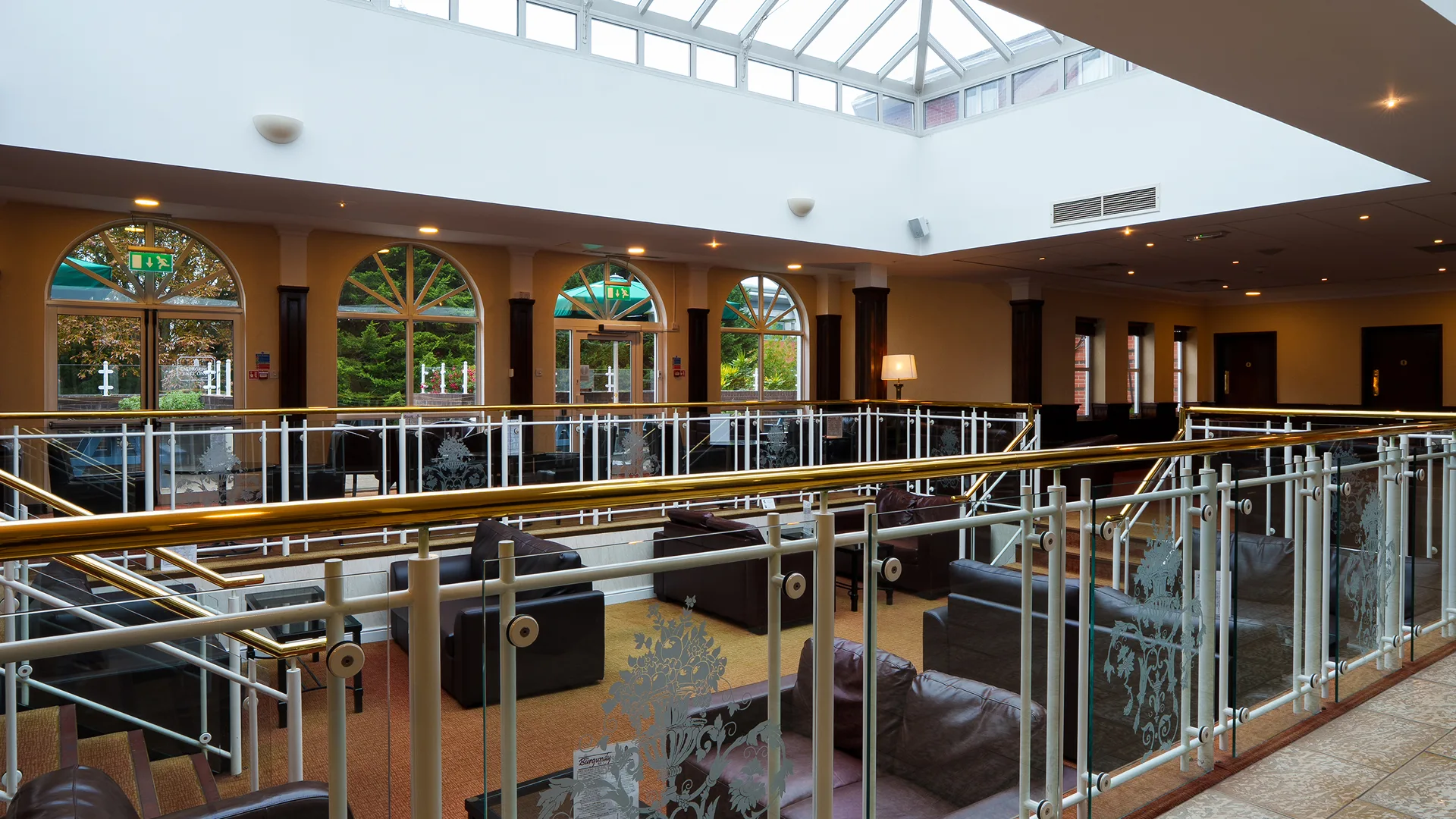 Bright, airy seating under the skylight at The Burgundy Bar. 